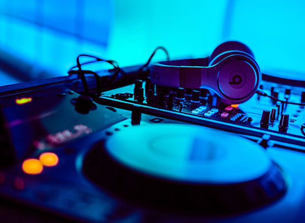An image of a DJ's decks on-board your private yacht on your Sydney Private Day Tour
