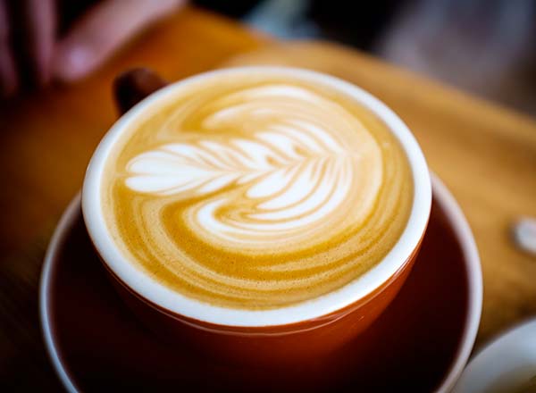 An image of a coffee from Single Origin Cafe in Surry Hills on your Sydney Underground tour